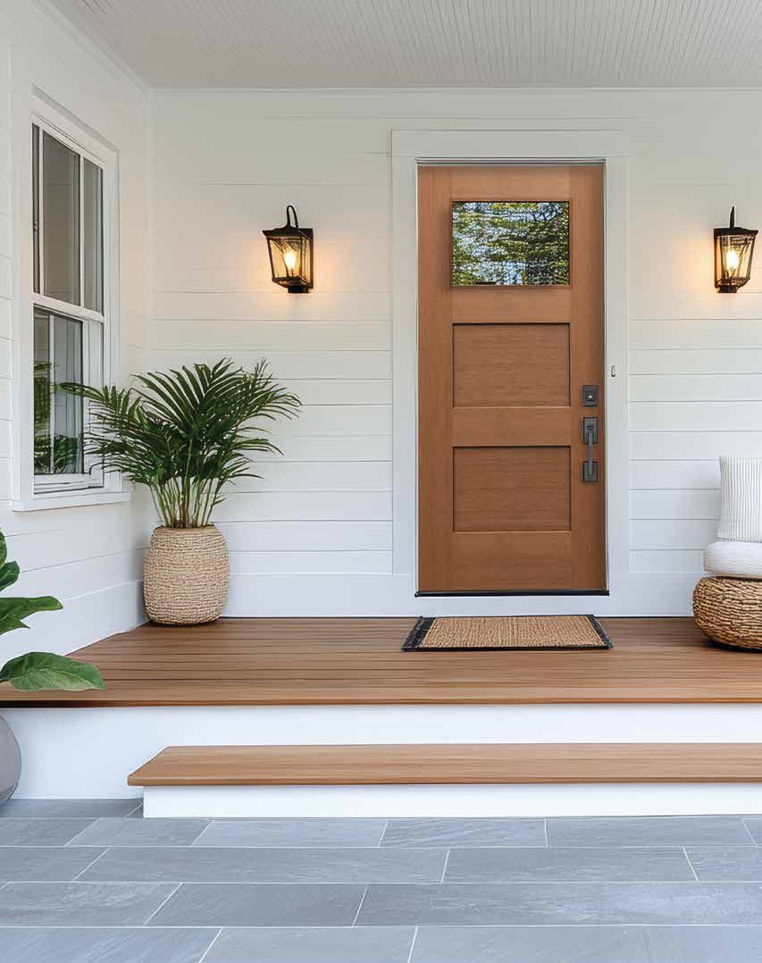 Woodgrain fiberglass entry door with lite on a covered porch